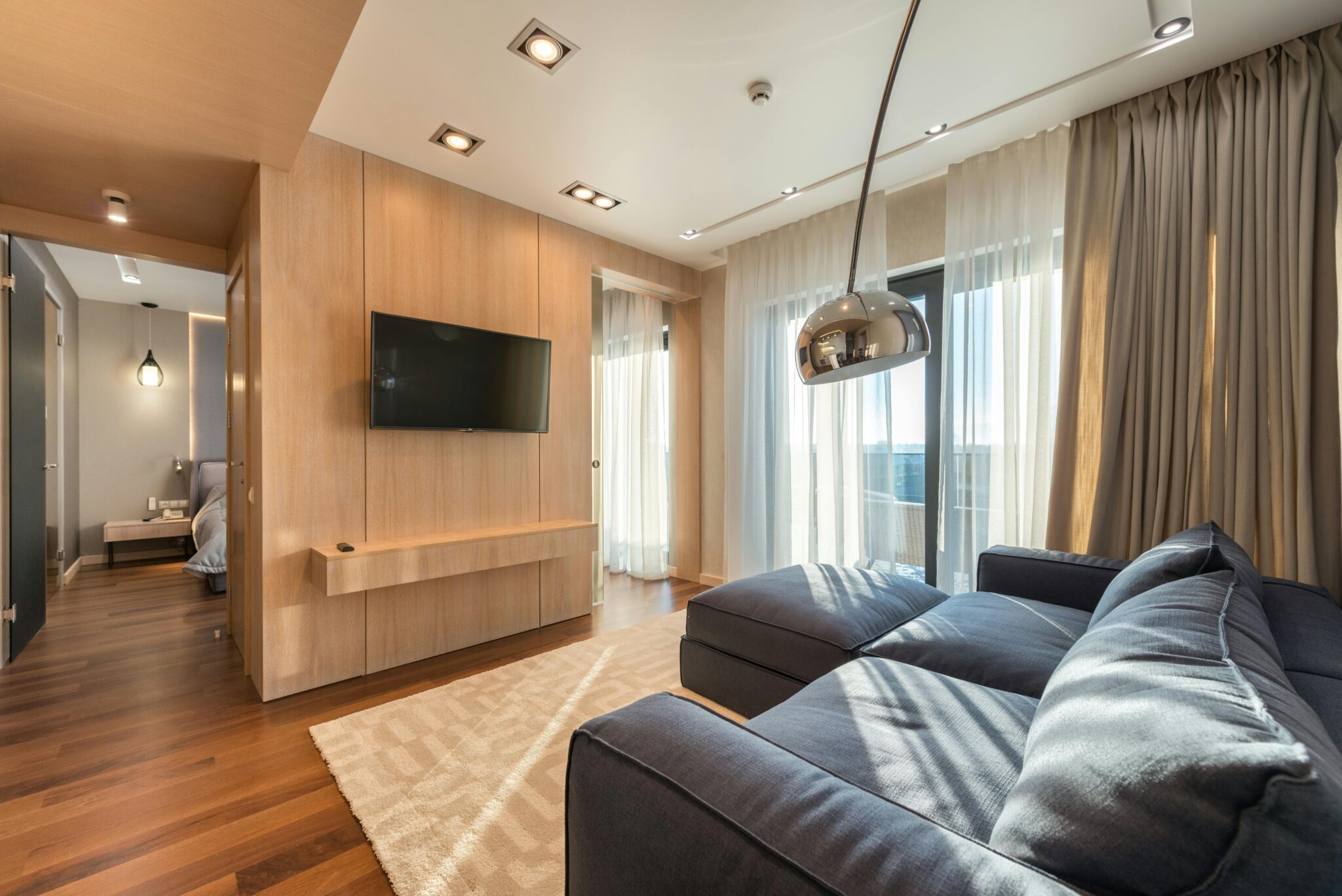 Wall-Mounted TV Cabinets with Fluted Wooden Panels